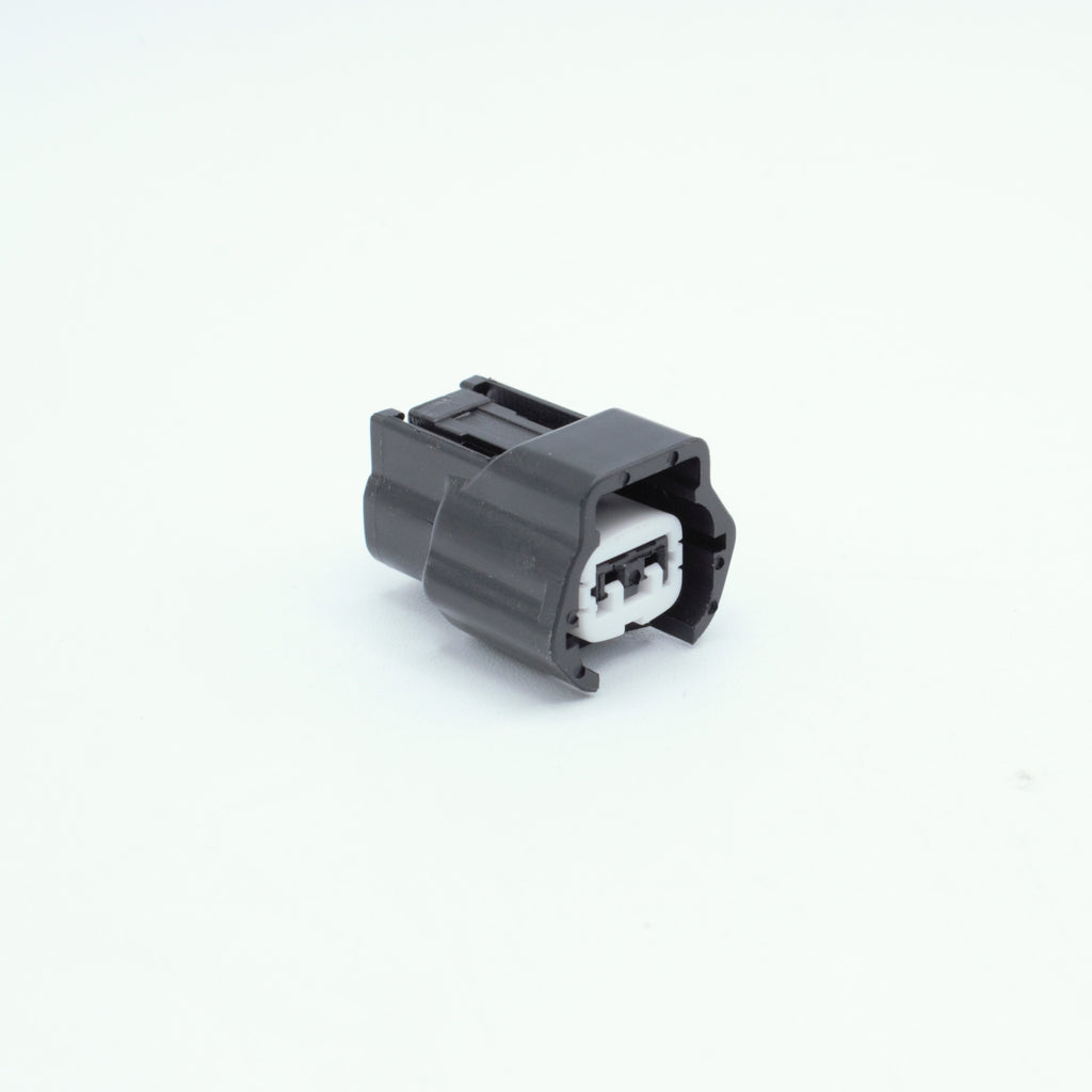 Nissan injector connector for RB and SR engines
Black with a white TPA 
left side low key right side high key
comes with terminals and seals
Made by Sumiomo RS type E series 2  pin way terminal, sealed
sold as a set of 4 or 6