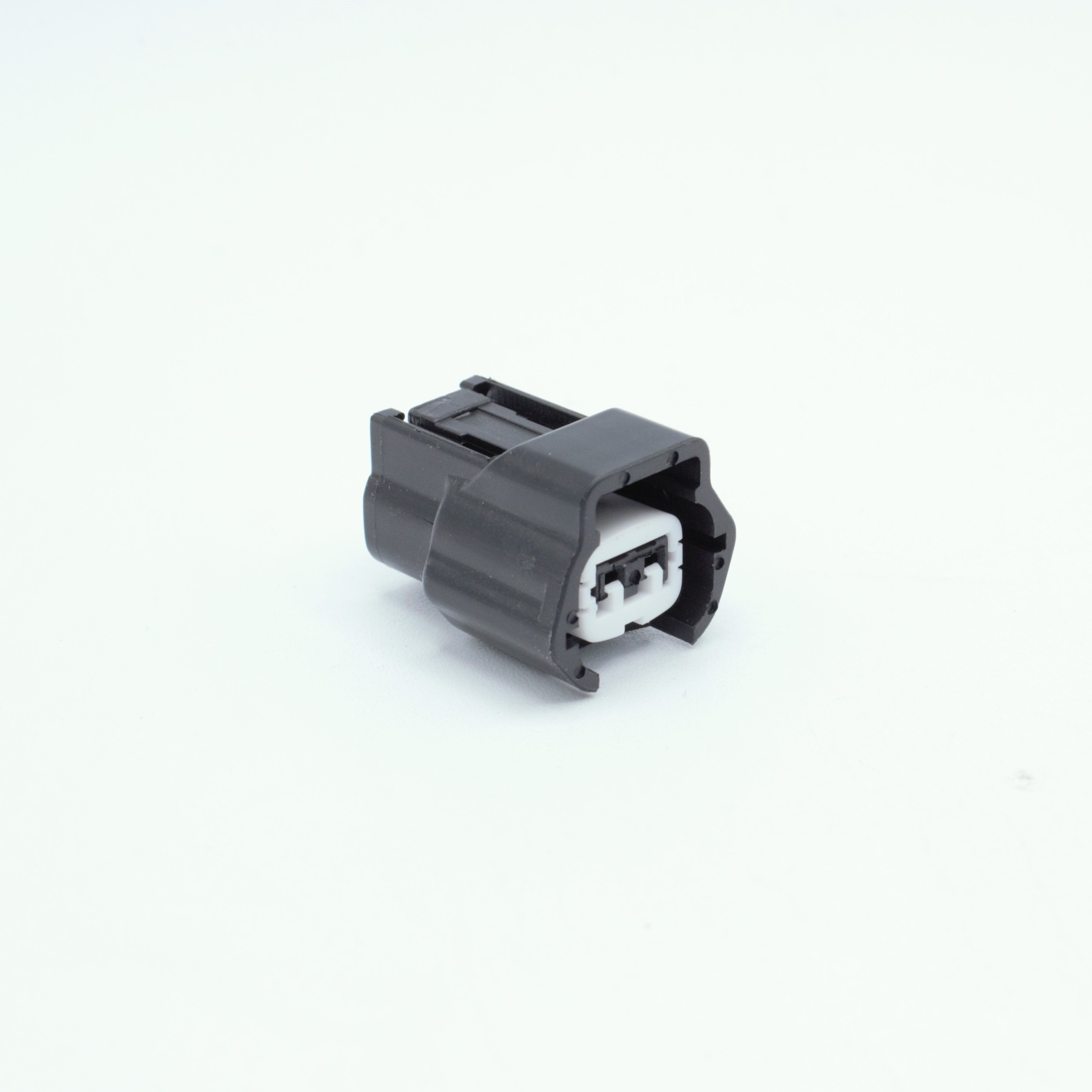 Nissan injector connector for RB and SR engines
Black with a white TPA 
left side low key right side high key
comes with terminals and seals
Made by Sumiomo RS type E series 2  pin way terminal, sealed
sold as a set of 4 or 6