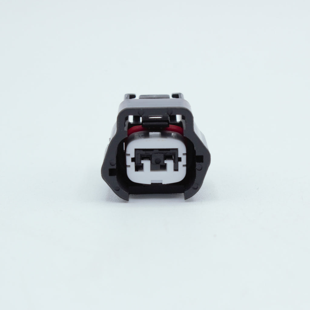 Nissan injector connector for RB and SR engines
Black with a white TPA 
left side low key right side high key
comes with terminals and seals 2 pin way terminal, sealed
Made by Sumiomo RS type E series
sold as a set of 4 or 6