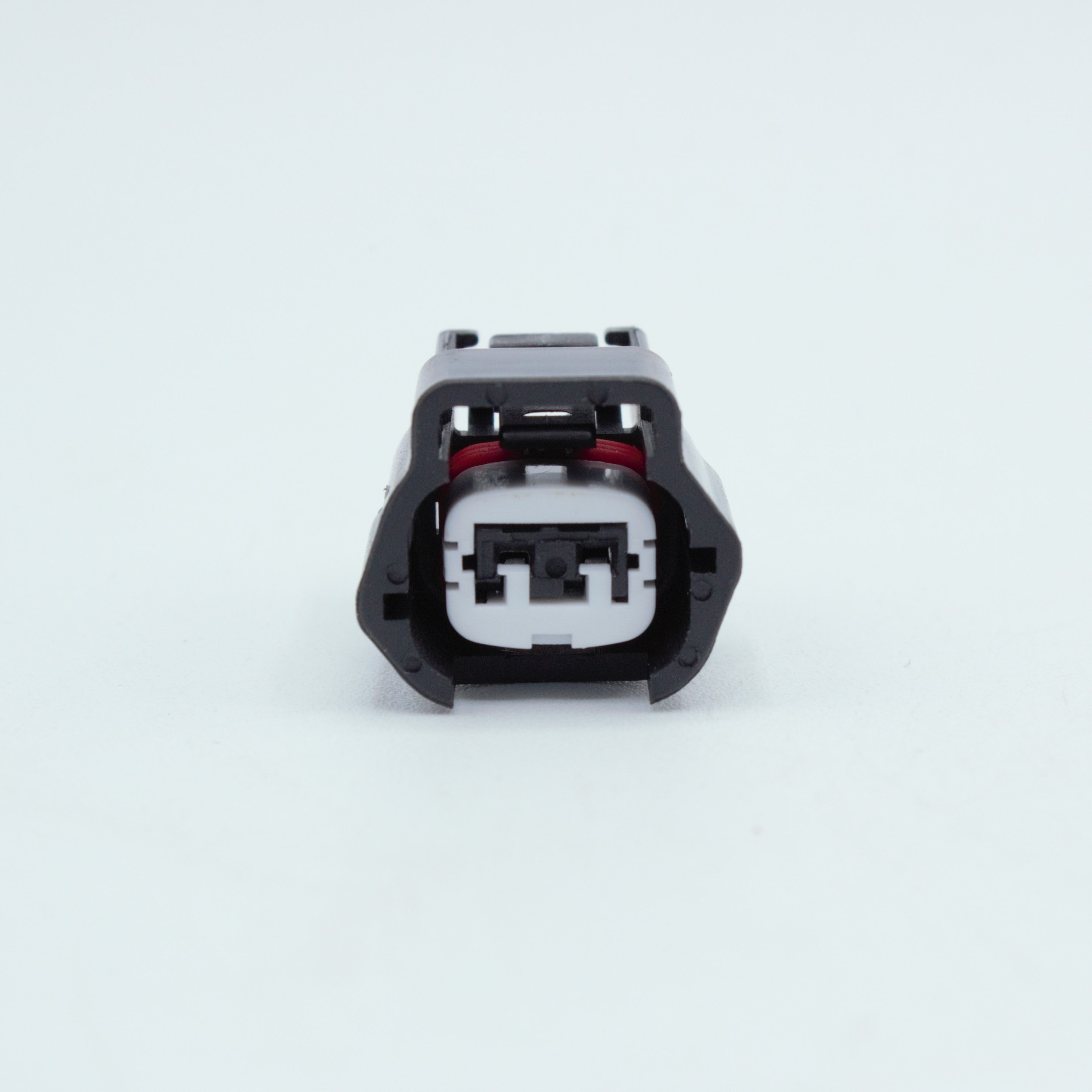 Nissan injector connector for RB and SR engines
Black with a white TPA 
left side low key right side high key
comes with terminals and seals 2 pin way terminal, sealed
Made by Sumiomo RS type E series
sold as a set of 4 or 6