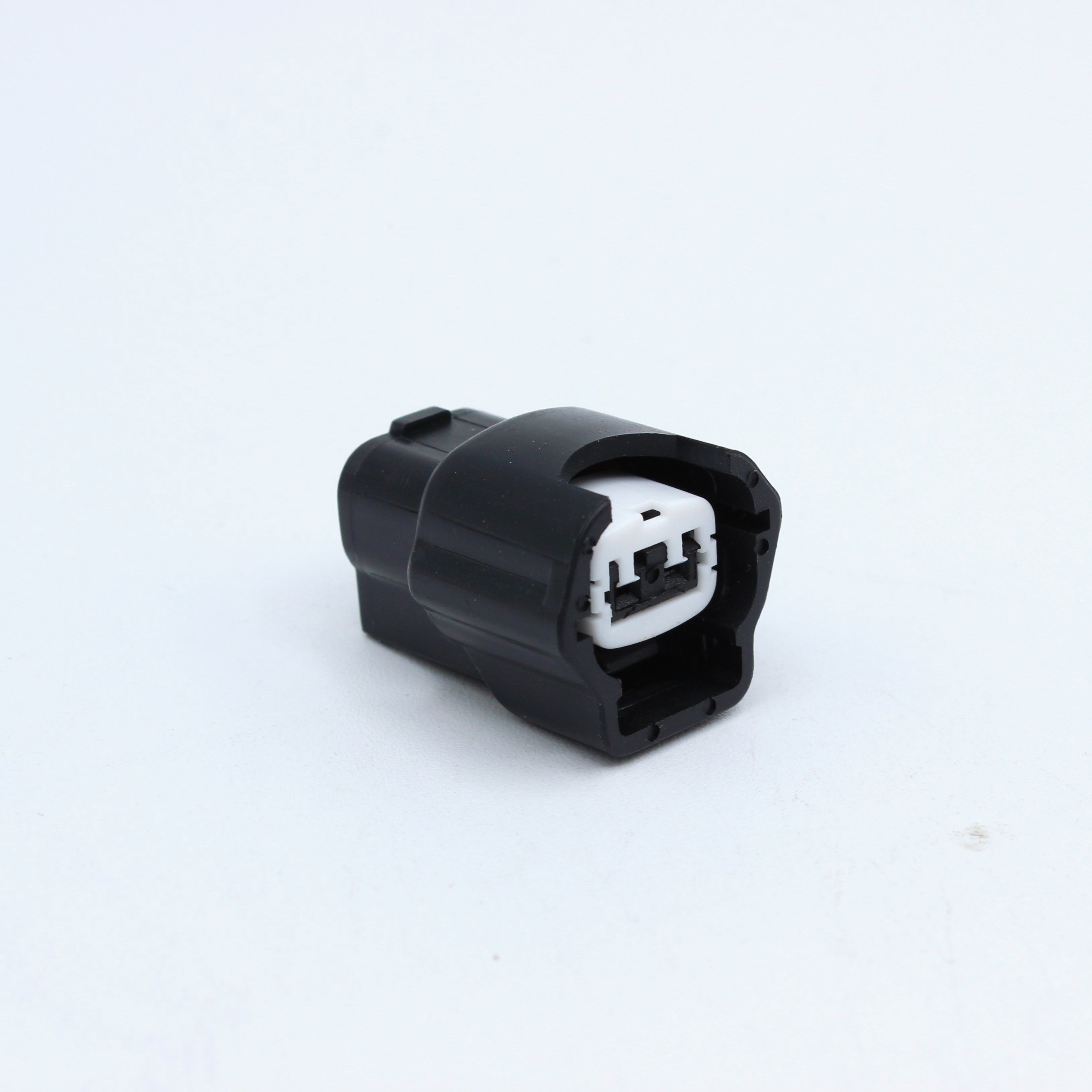Nissan injector connector for RB and SR engines
Black with a white TPA 
left side low key right side high key
comes with terminals and seals
Made by Sumiomo RS type E series 2 pin way terminal, sealed
sold as a set of 4 or 6