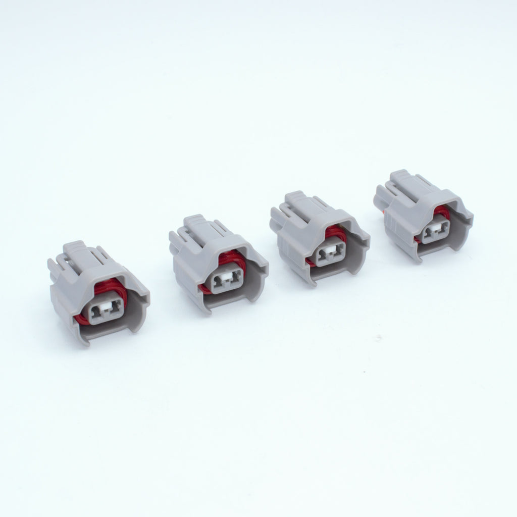 Set of 4 Toyota EV6 USCAR injector connector
Grey with a red seal orange seal and a white TPA
Has 2 keys that are high higher close to top
2 terminal, sealed
Made by Sumitomo TS series
sold in sets of 4, 6 or 8 
For 1JZ 2JZ 1UZ 3UZ engines