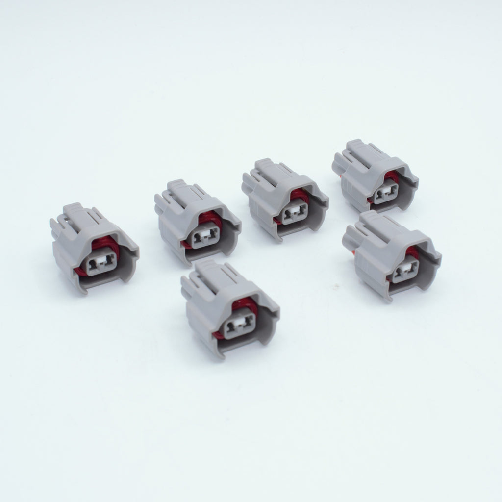 Set of 6 Toyota EV6 USCAR injector connector
Grey with a red seal orange seal and a white TPA
Has 2 keys that are high higher close to top
2 terminal, sealed
Made by Sumitomo TS series
sold in sets of 4, 6 or 8 
For 1JZ 2JZ 1UZ 3UZ engines