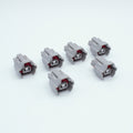 Set of 6 Toyota EV6 USCAR injector connector
Grey with a red seal orange seal and a white TPA
Has 2 keys that are high higher close to top
2 terminal, sealed
Made by Sumitomo TS series
sold in sets of 4, 6 or 8 
For 1JZ 2JZ 1UZ 3UZ engines