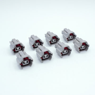 Set of 8 Toyota EV6 USCAR injector connector
Grey with a red seal orange seal and a white TPA
Has 2 keys that are high higher close to top
2 terminal, sealed
Made by Sumitomo TS series
sold in sets of 4, 6 or 8 
For 1JZ 2JZ 1UZ 3UZ engines