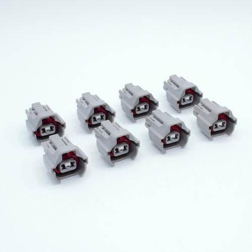Set of 8 Toyota EV6 USCAR injector connector
Grey with a red seal orange seal and a white TPA
Has 2 keys that are high higher close to top
2 terminal, sealed
Made by Sumitomo TS series
sold in sets of 4, 6 or 8 
For 1JZ 2JZ 1UZ 3UZ engines