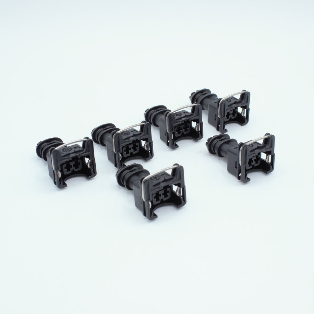 Set of 6 EV1 Jetronic fuel injector connectors
black with a metal retention tang CPA and a black TPA at the back
Uses JPT terminals, sealed
Made by TE formerly Bosch

sold as a set of 4, 6 or 8 with terminals and seals