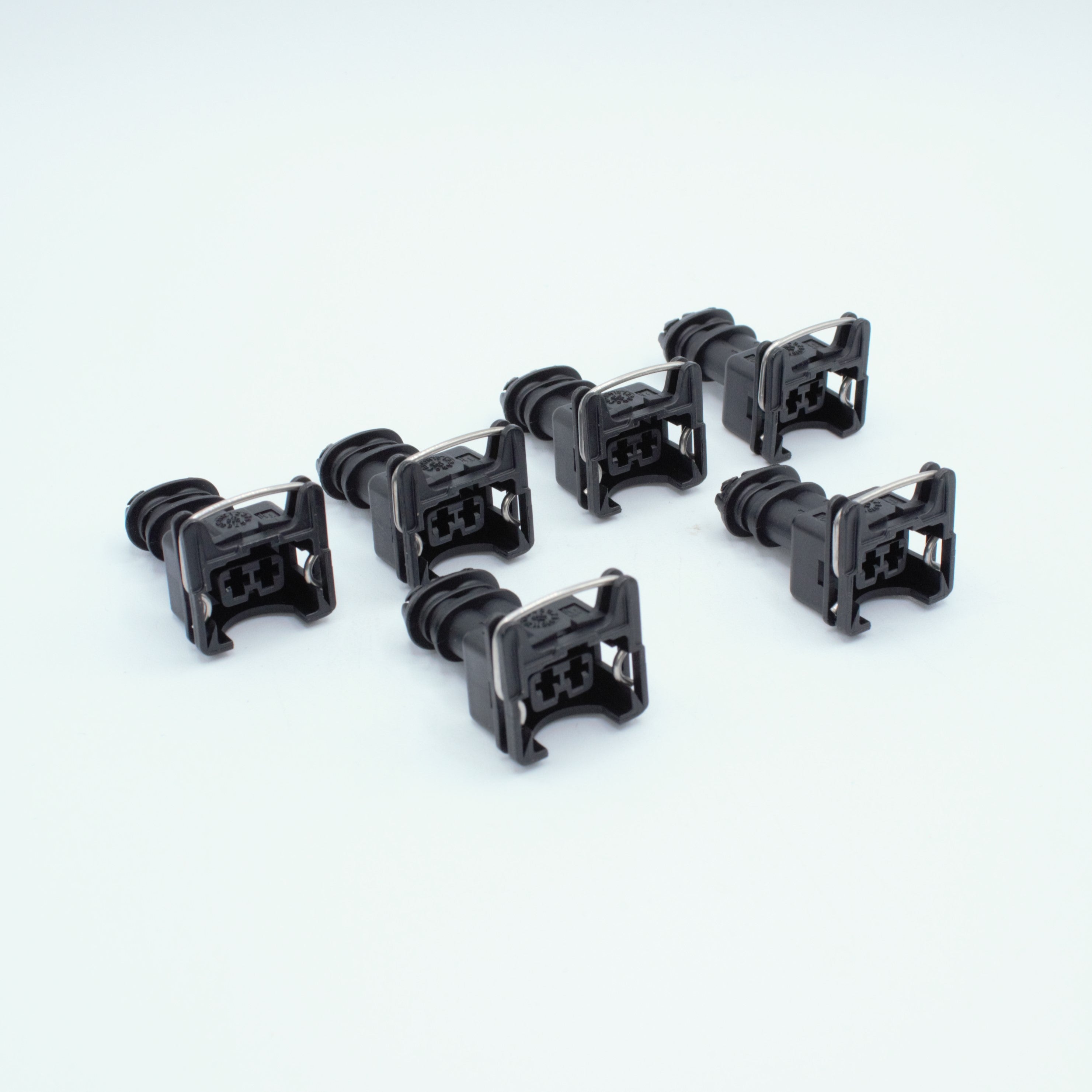 Set of 6 EV1 Jetronic fuel injector connectors
black with a metal retention tang CPA and a black TPA at the back
Uses JPT terminals, sealed
Made by TE formerly Bosch

sold as a set of 4, 6 or 8 with terminals and seals