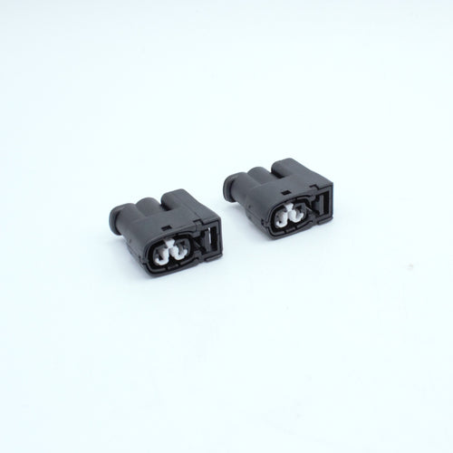 Set of 2 toyota ignition coil connectors
2 pin way terminal, sealed
Black with white TPA in center
Made by Yazaki Sumitomo 090 090II series

commonly used in UZ ignition systems with distributors and 1JZ 2JZ coils as well as 7M and other Toyota engines

sold as a set of 2, 3 or 6, comes with terminals and seals