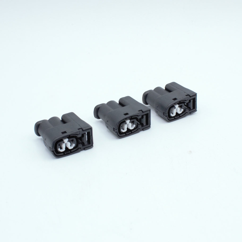 Set of 3 toyota ignition coil connectors
2 pin way terminal, sealed
Black with white TPA in center
Made by Yazaki Sumitomo 090 090II series

commonly used in UZ ignition systems with distributors and 1JZ 2JZ coils as well as 7M and other Toyota engines

sold as a set of 2, 3 or 6, comes with terminals and seals