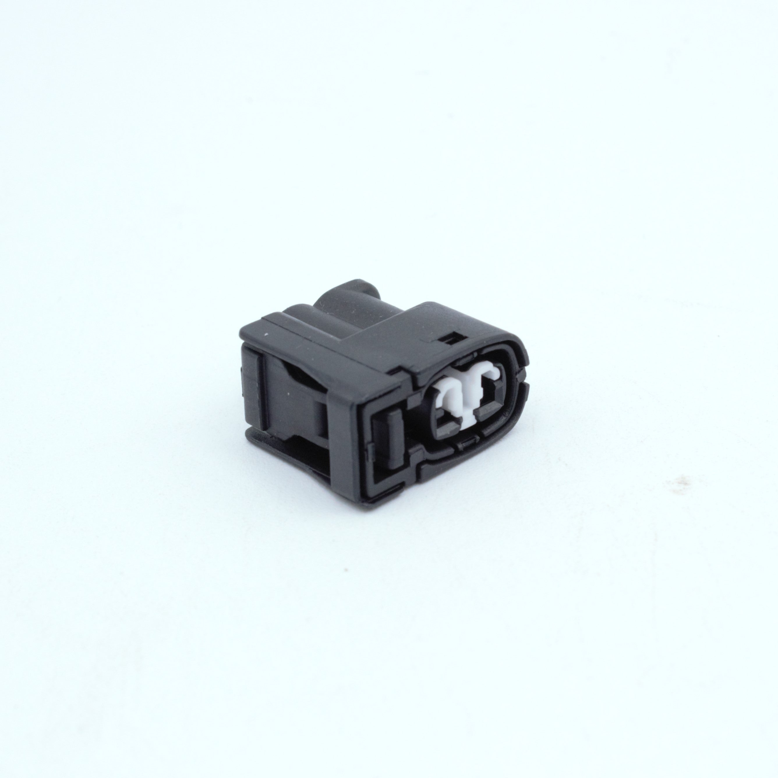 Toyota ignition coil connector
2 pin way terminal, sealed
Black with white TPA in center
Made by Yazaki Sumitomo 090 090II series

commonly used in UZ ignition systems with distributors and 1JZ 2JZ coils as well as 7M and other Toyota engines

sold as a set of 2, 3 or 6, comes with terminals and seals